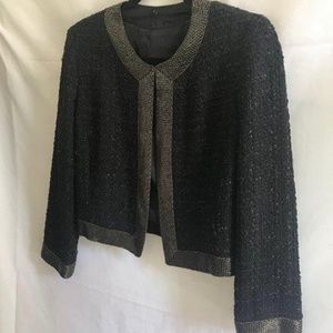 Metallic and knotted jacket